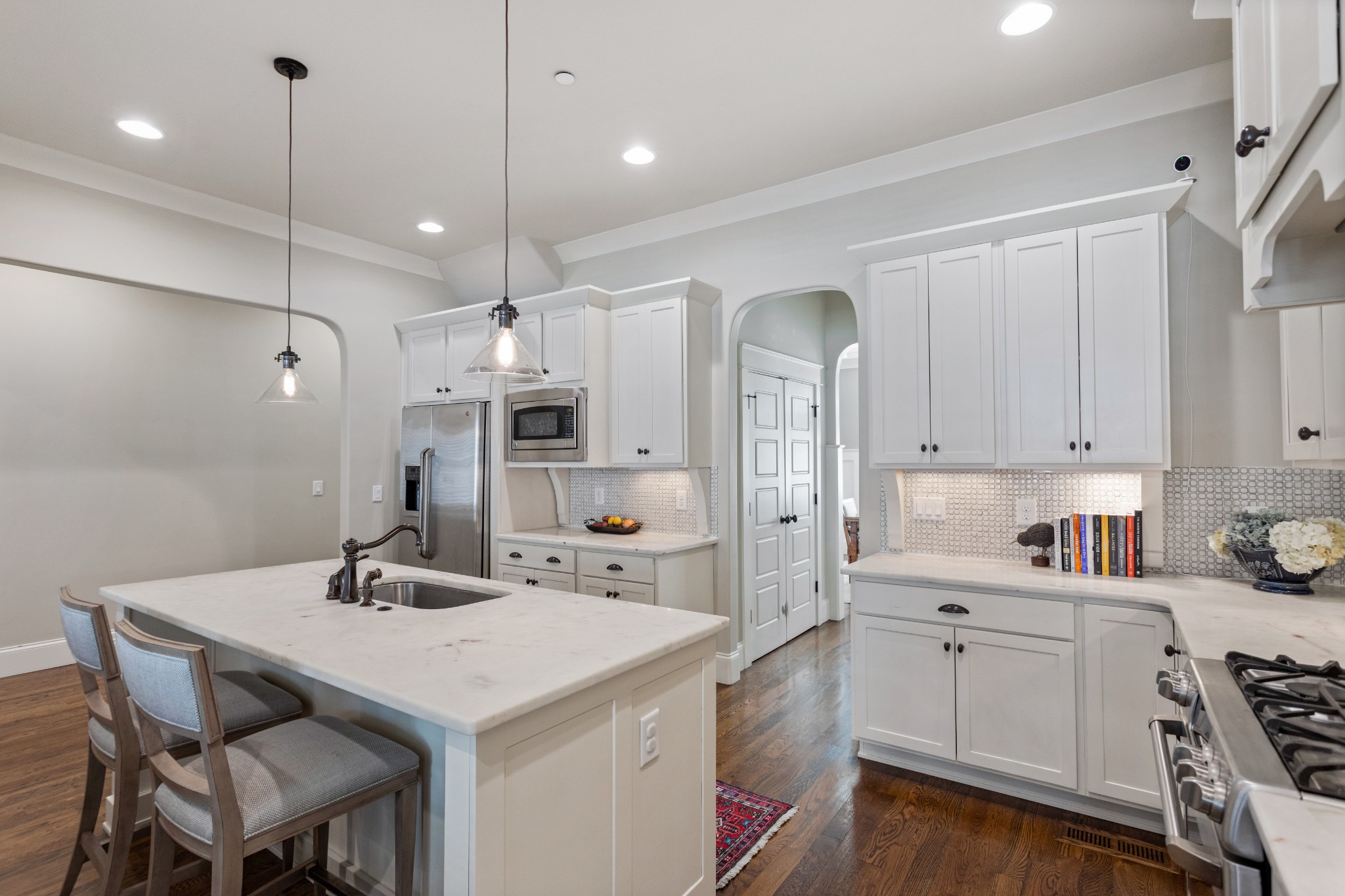 611 Estes Road Nashville, TN 37215 - Photo 8 of 27 a kitchen with a sink a stove a refrigerator and cabinets