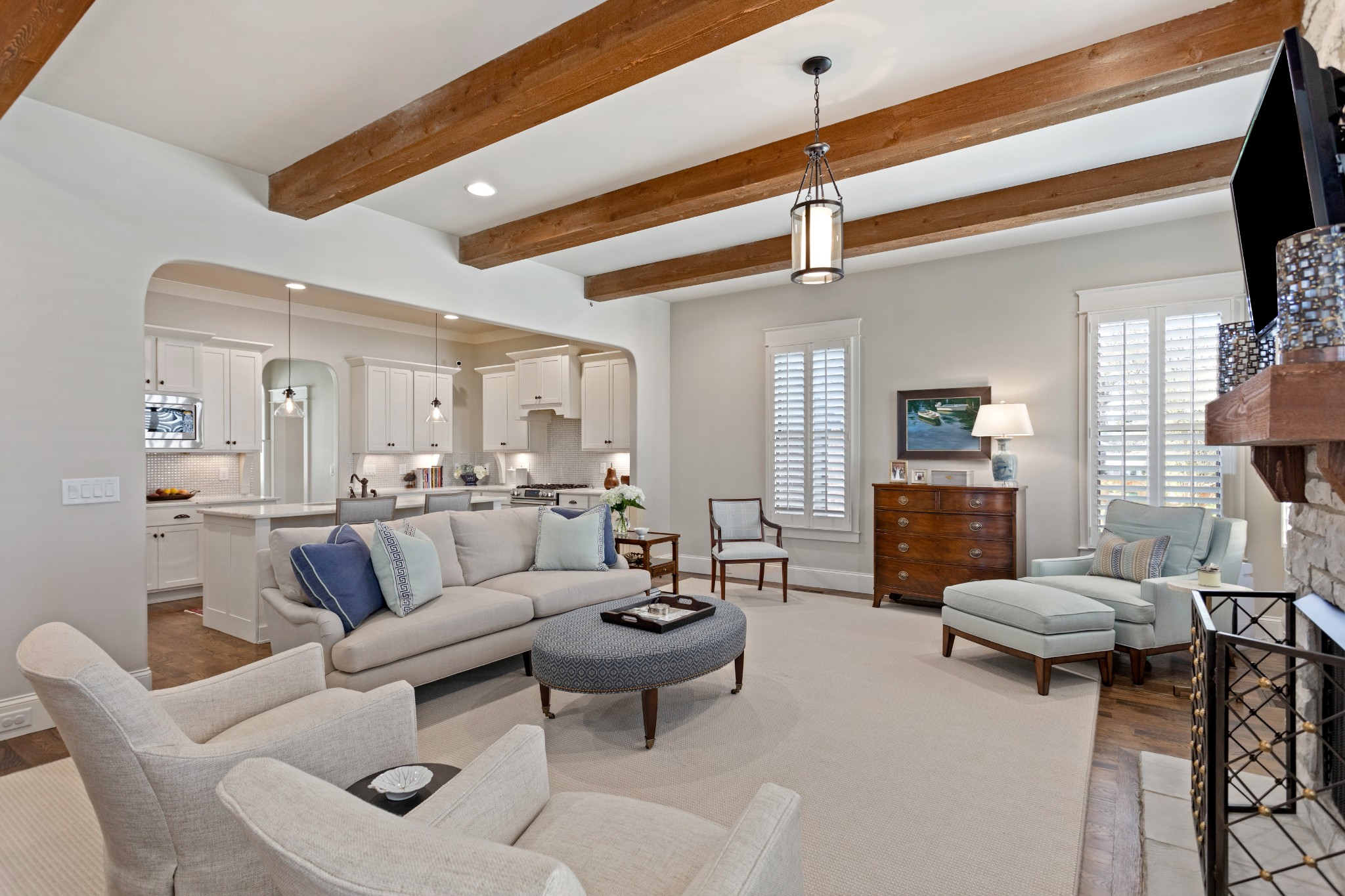 611 Estes Road Nashville, TN 37215 - Photo 10 of 27 a living room with furniture a fireplace and a chandelier