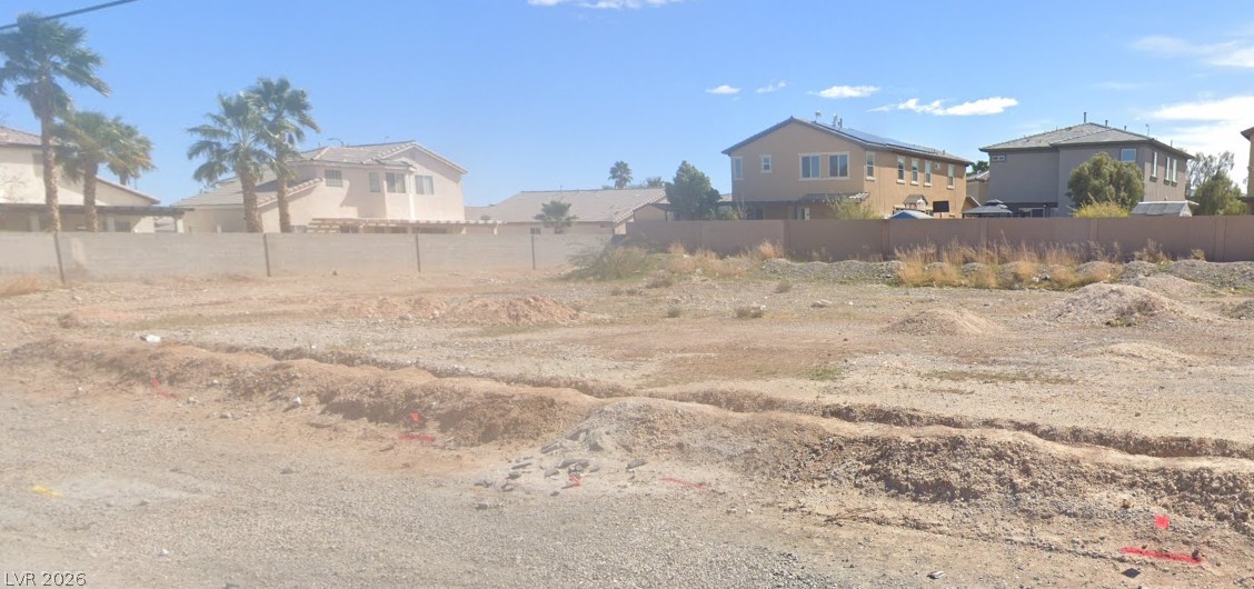 Gowan Road North Las Vegas, NV 89032 - Photo 4 of 6 A spacious residential lot awaits construction within an established suburban neighborhood.