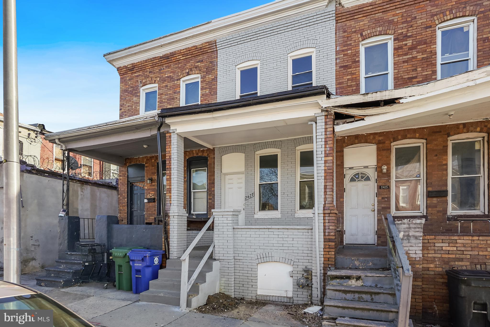 2427 East Lanvale Street Baltimore, MD 21213 - Photo 2 of 29 a front view of a house