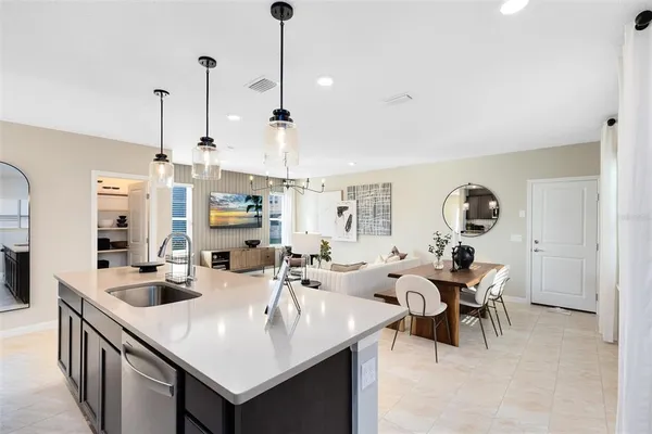 a view of kitchen island with stainless steel appliances