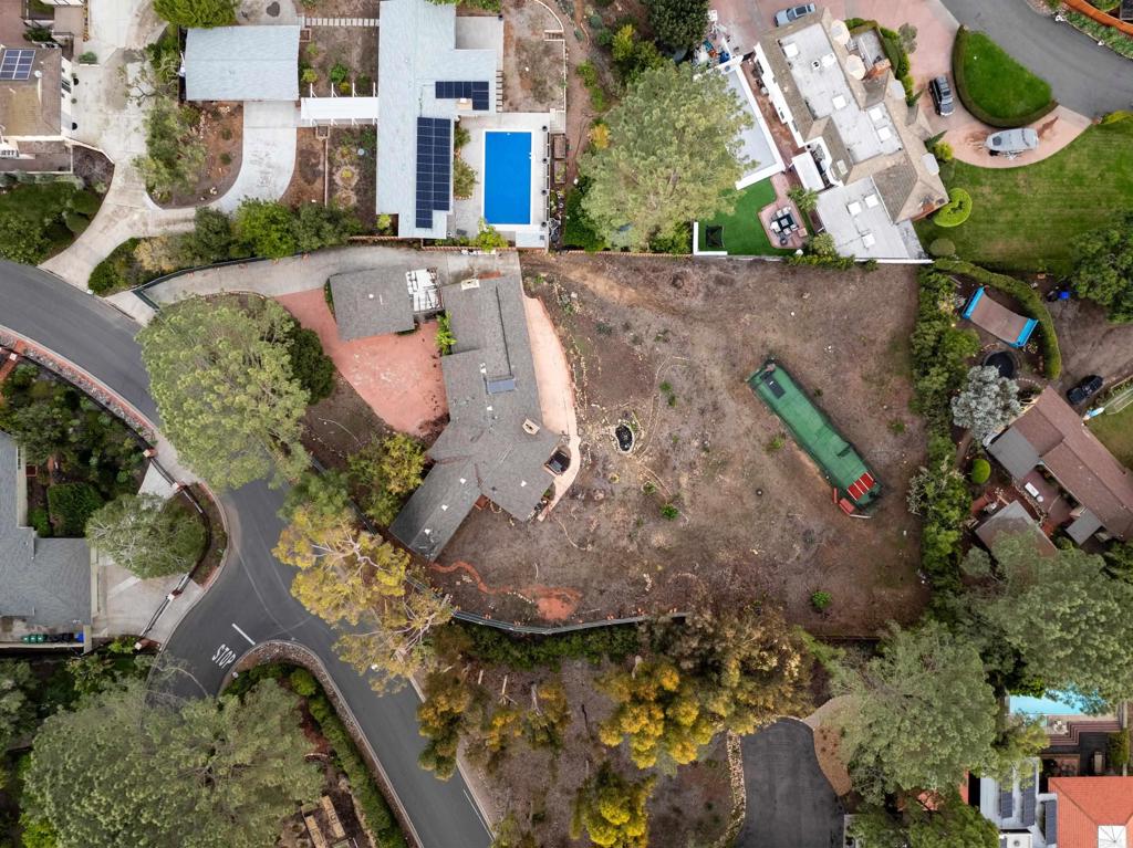 1645 Los Altos Road San Diego, CA 92109 - Photo 13 of 19 an aerial view of a house with a yard and lake