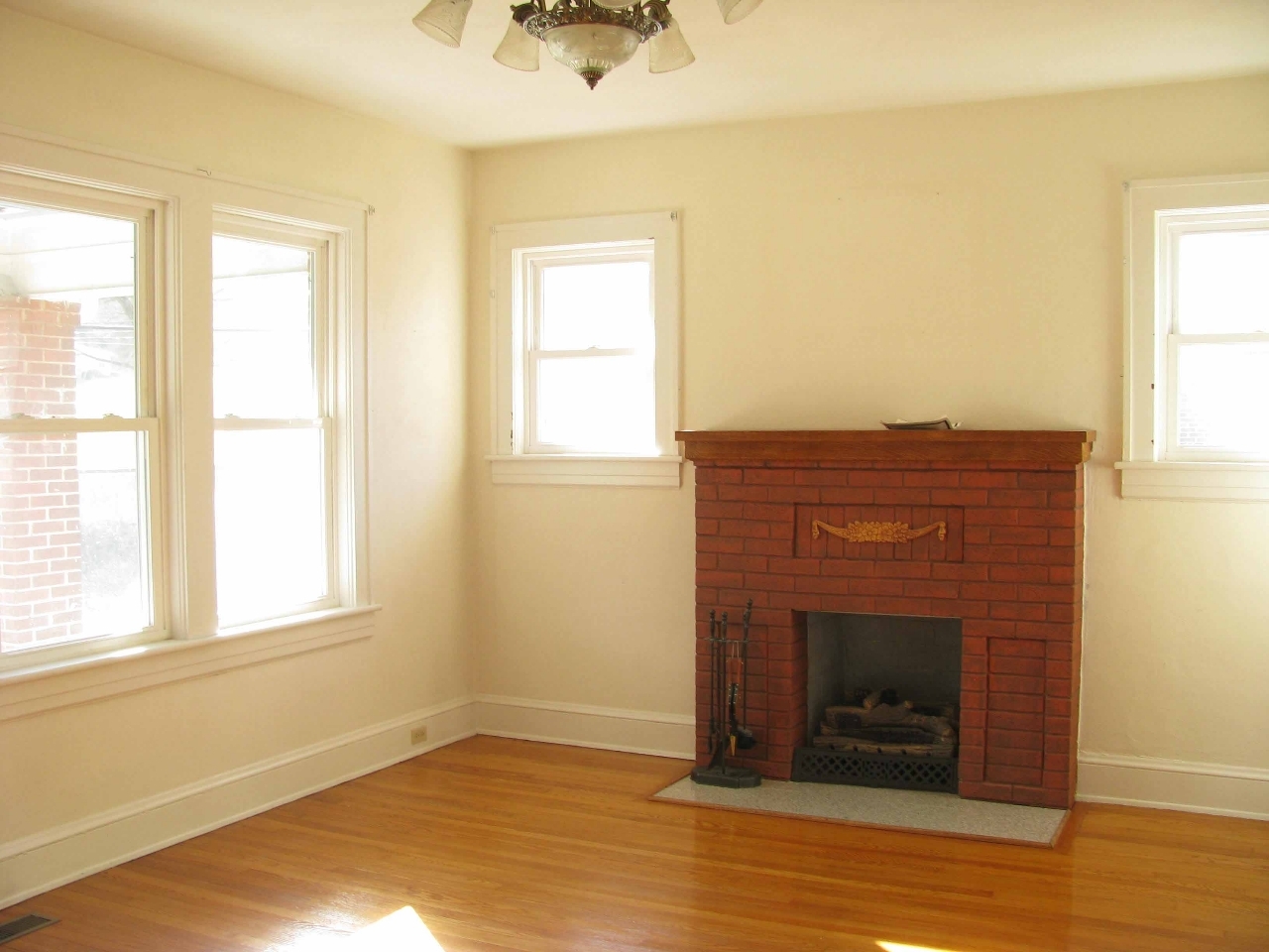 187 Webster Road Roanoke, VA 24012 - Photo 4 of 18 Living Room windows & fireplace