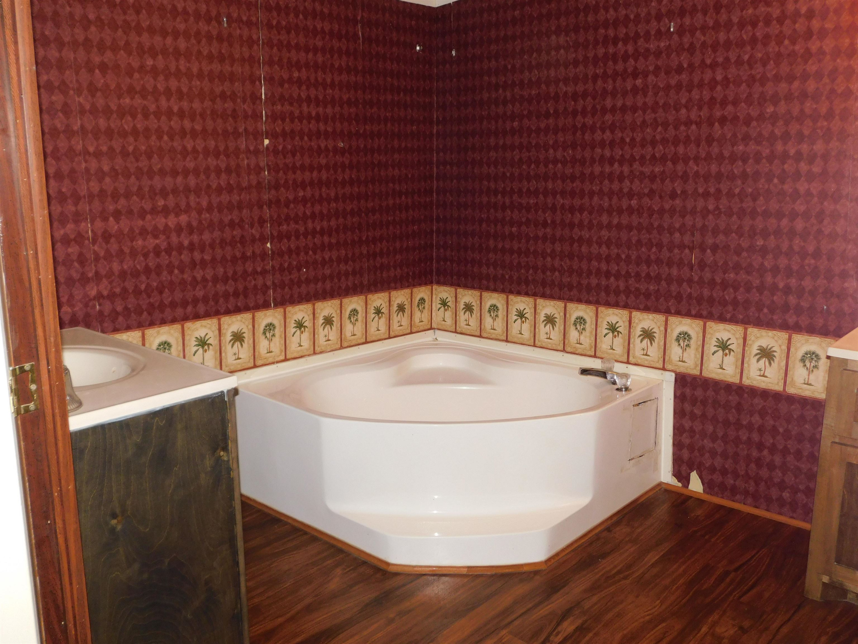479 Fowler Road Beech Bluff, TN 38313 - Photo 13 of 18 a view of a bathtub in a bathroom