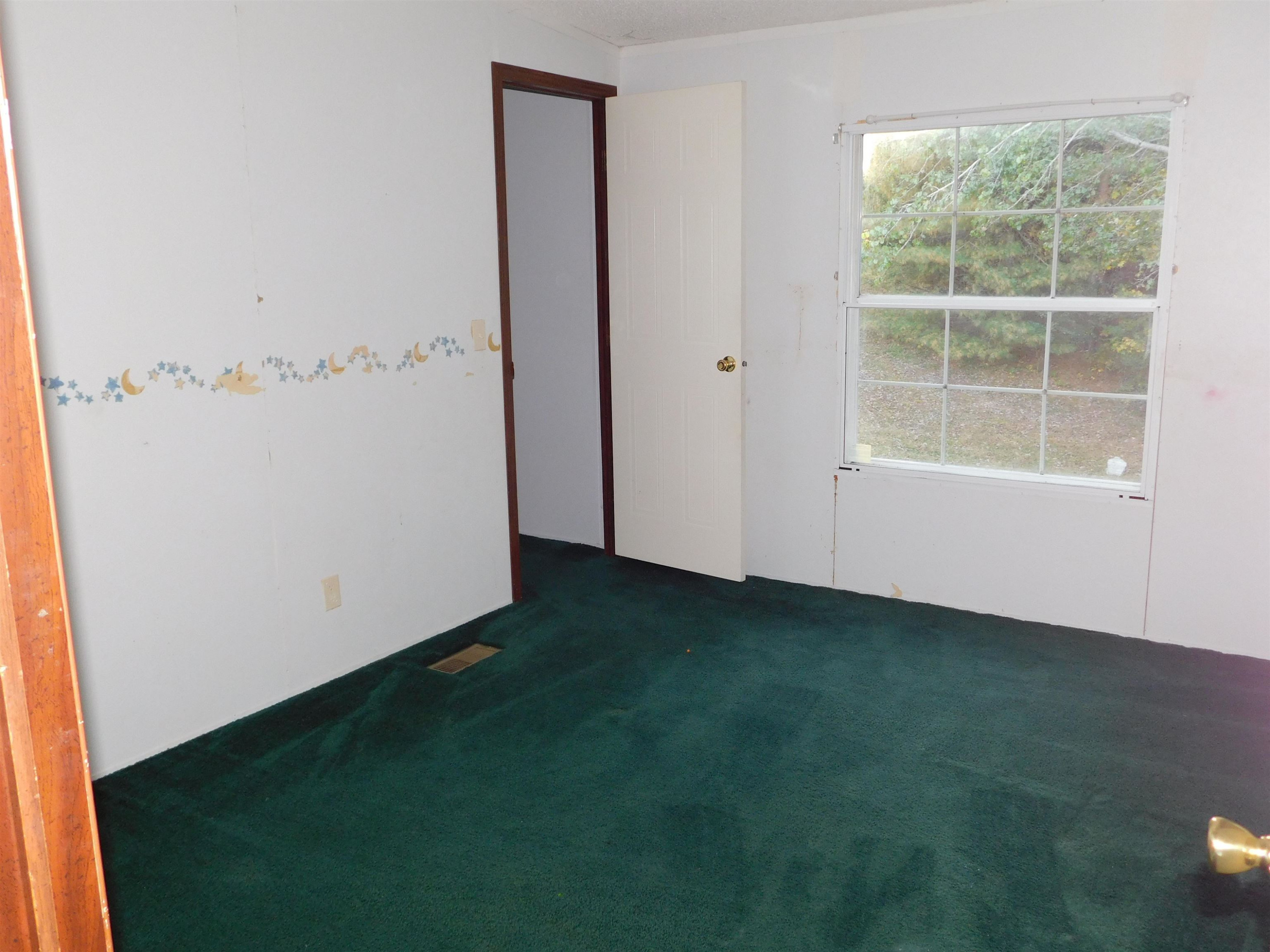 479 Fowler Road Beech Bluff, TN 38313 - Photo 14 of 18 a view of an empty room with a window