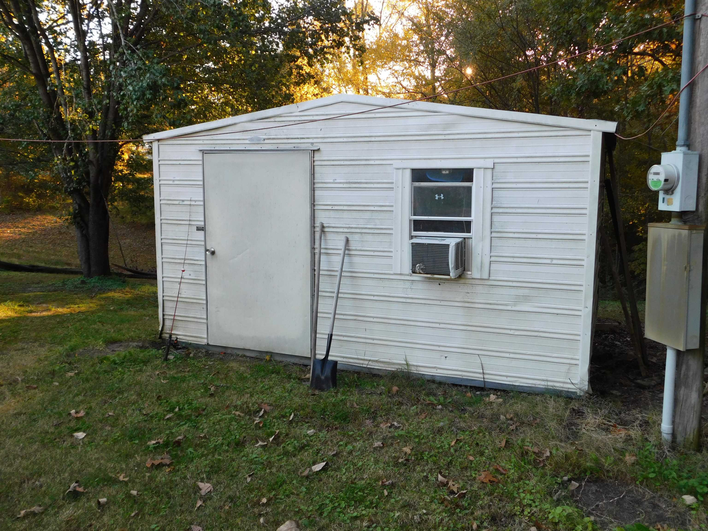 479 Fowler Road Beech Bluff, TN 38313 - Photo 18 of 18 a view of a small house and a yard