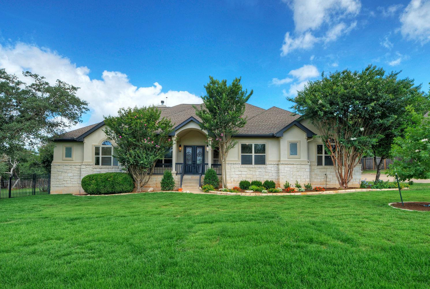 12012 Uplands Ridge Drive Bee Cave, TX 78738 - Photo 2 of 39 Over an acre in the gated Uplands community, just minutes from Hill Country Galleria, Whole Foods, Trader Joe's, H-E-B, and Lake Travis ISD schools.