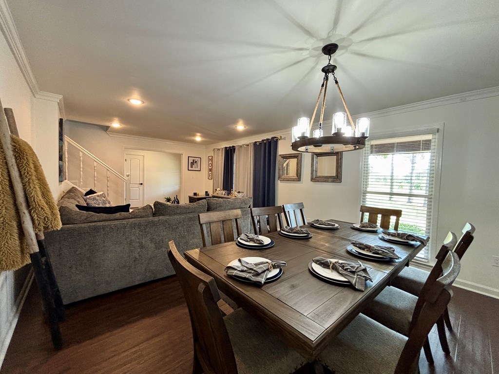 142 Gammage Road Eufaula, AL 36027 - Photo 28 of 47 a view of a dining room with furniture window and wooden floor