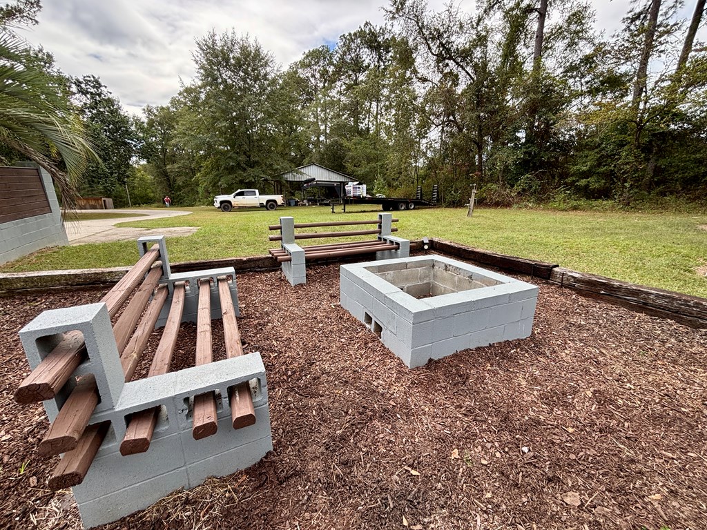 142 Gammage Road Eufaula, AL 36027 - Photo 7 of 47 a view of a yard with sitting area