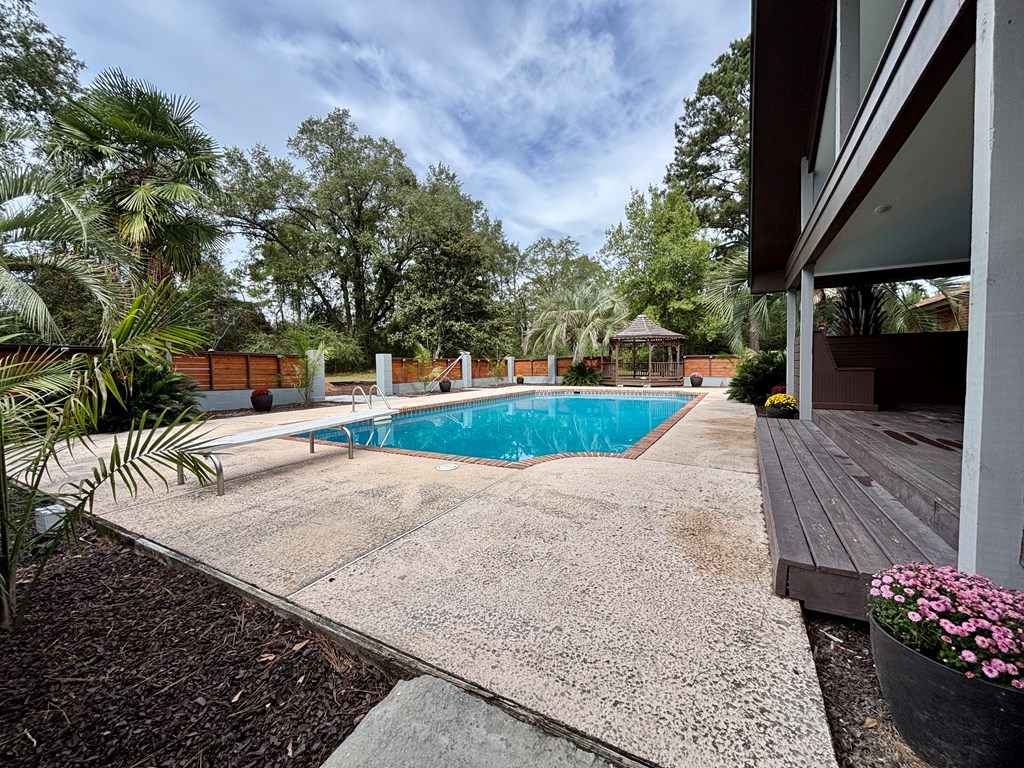 142 Gammage Road Eufaula, AL 36027 - Photo 9 of 47 swimming pool view with a sitting space