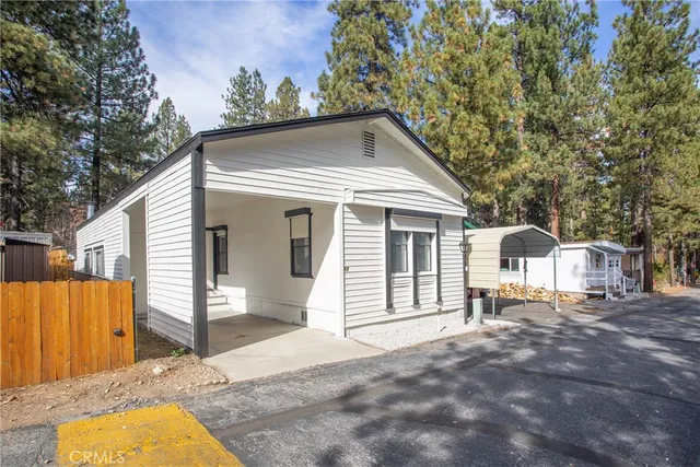 a backyard of a house with seating space