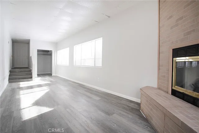 a view of livingroom with furniture and wooden floor