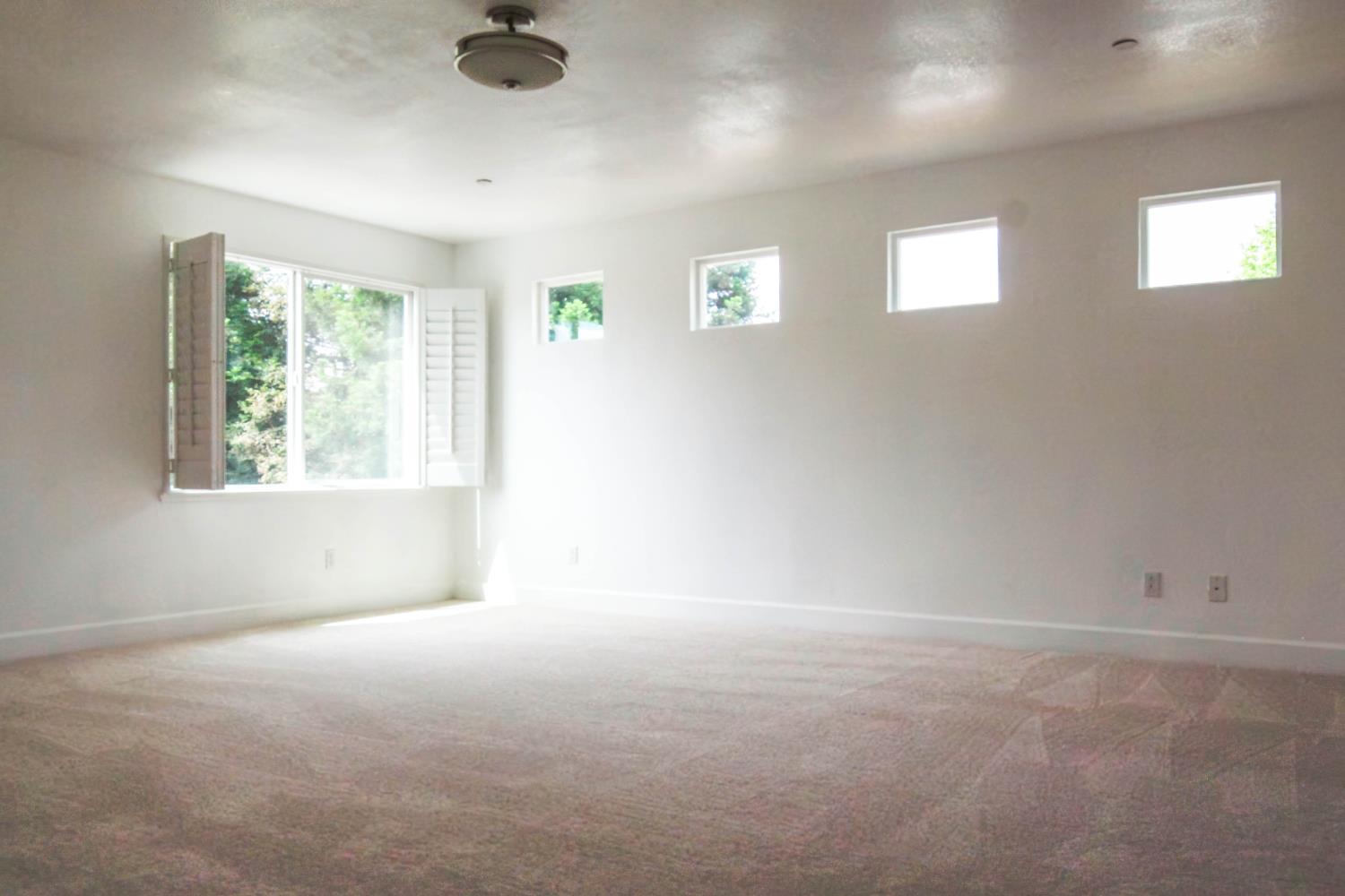 1817 Thomas Court Modesto, CA 95355 - Photo 13 of 20 an empty room with windows