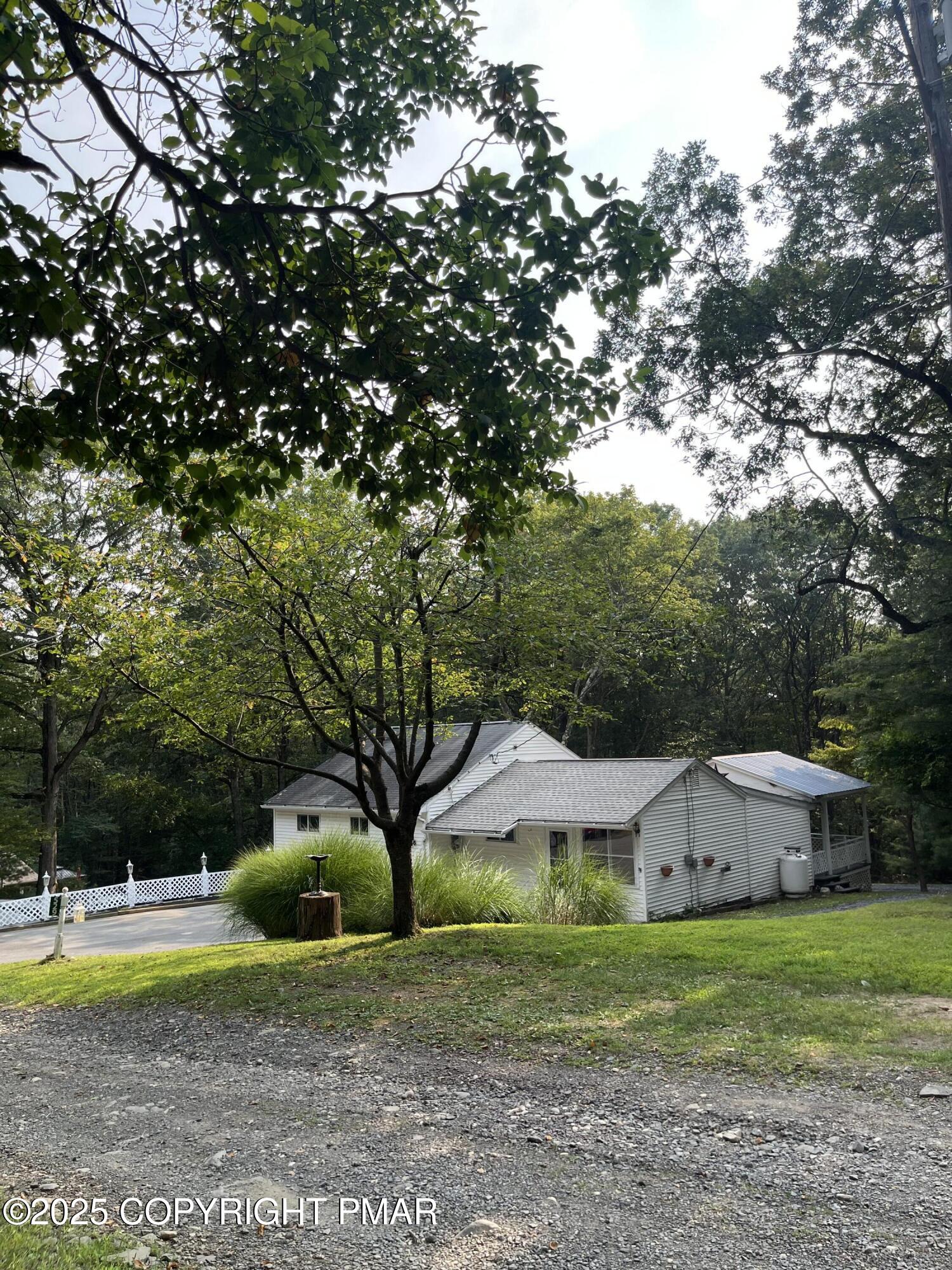 529 Pine Ridge Road Stroudsburg, PA 18360 - Photo 2 of 36 a view of a house with a yard