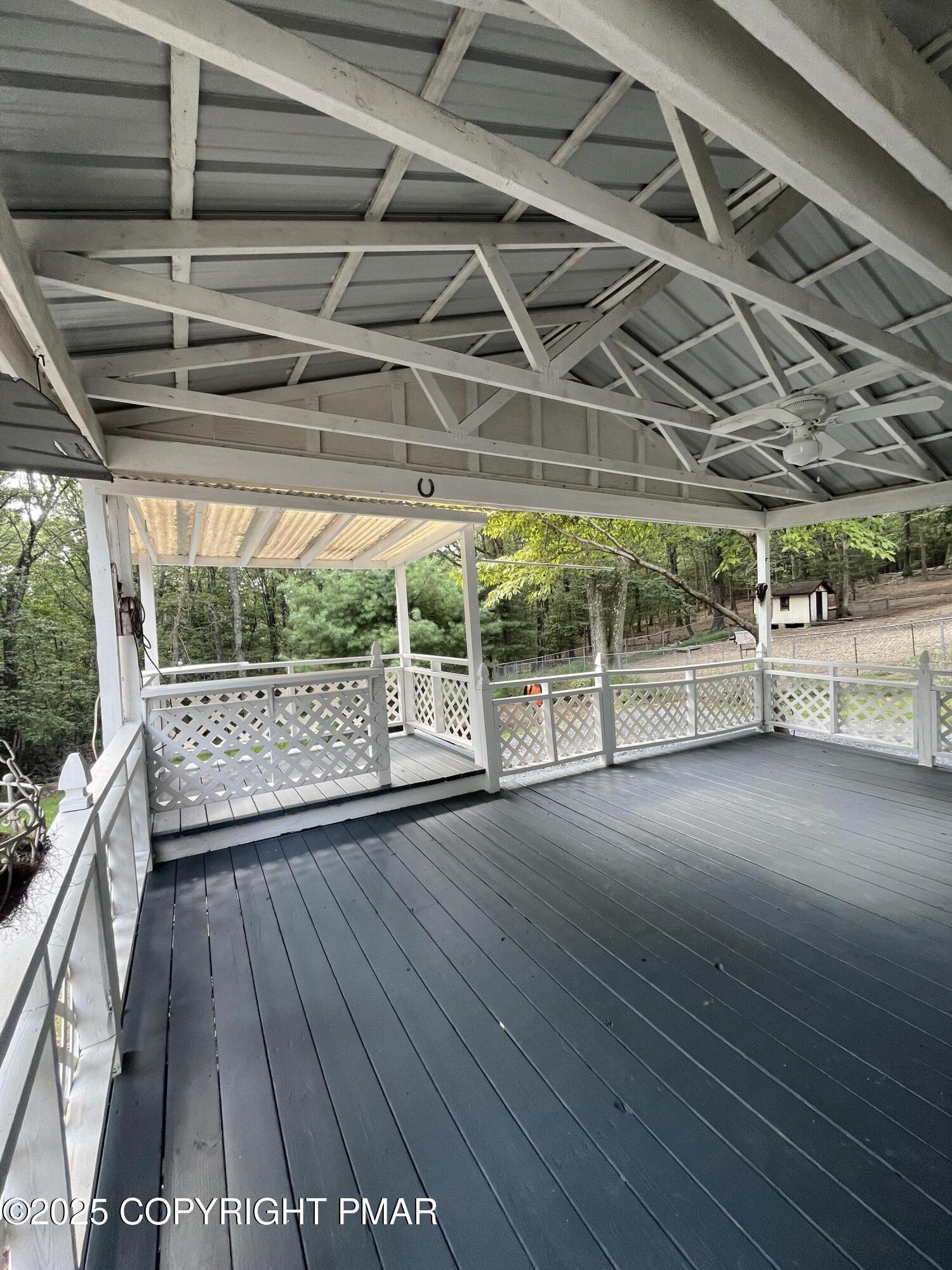 529 Pine Ridge Road Stroudsburg, PA 18360 - Photo 8 of 36 a view of a shaded area with wooden floor