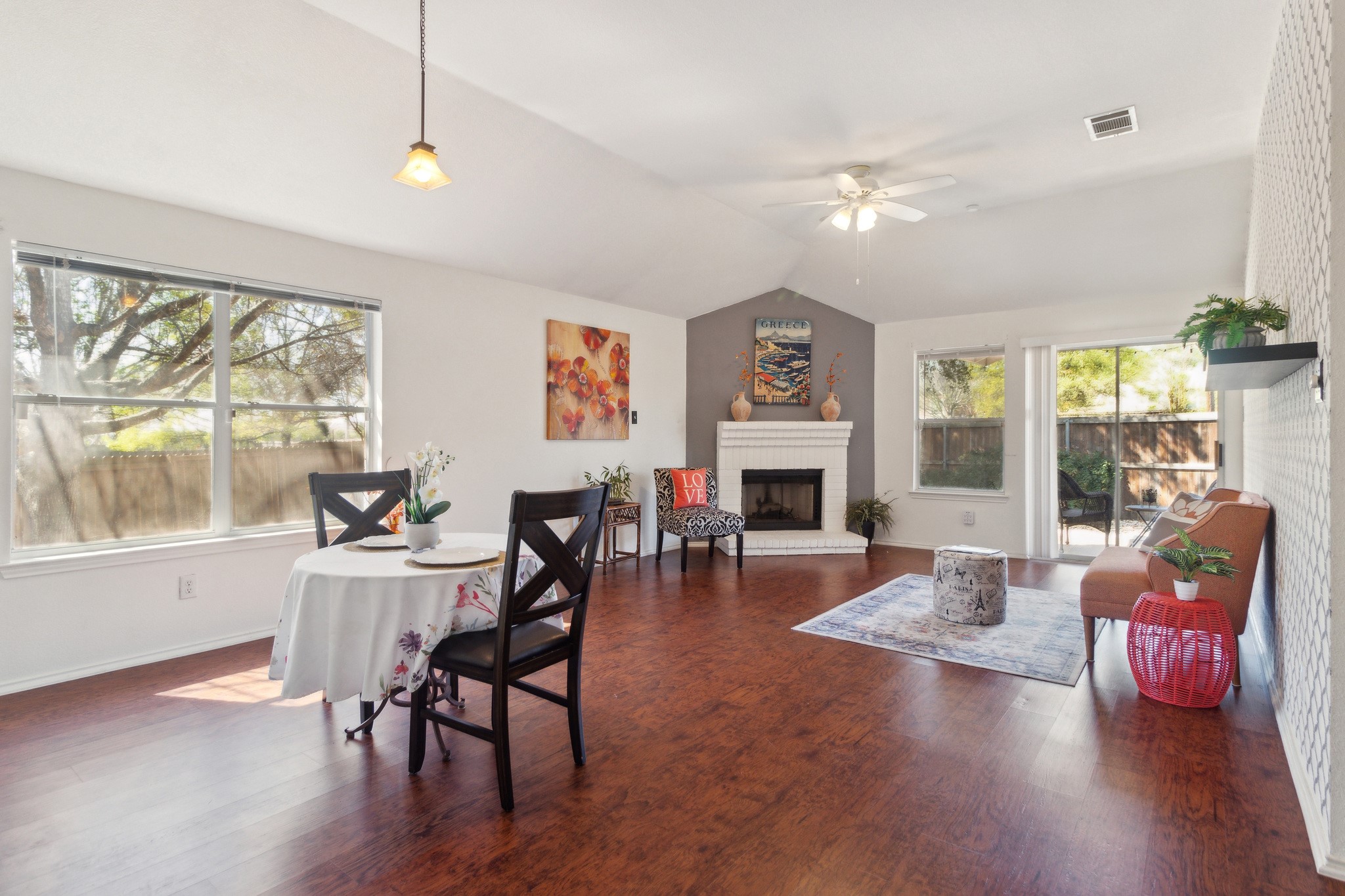 12316 Sugar Leaf Place Austin, TX 78748 - Photo 4 of 16 a living room with fireplace furniture and a wooden floor