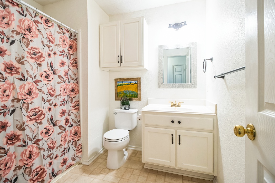 12316 Sugar Leaf Place Austin, TX 78748 - Photo 10 of 16 a bathroom with a sink toilet and shower
