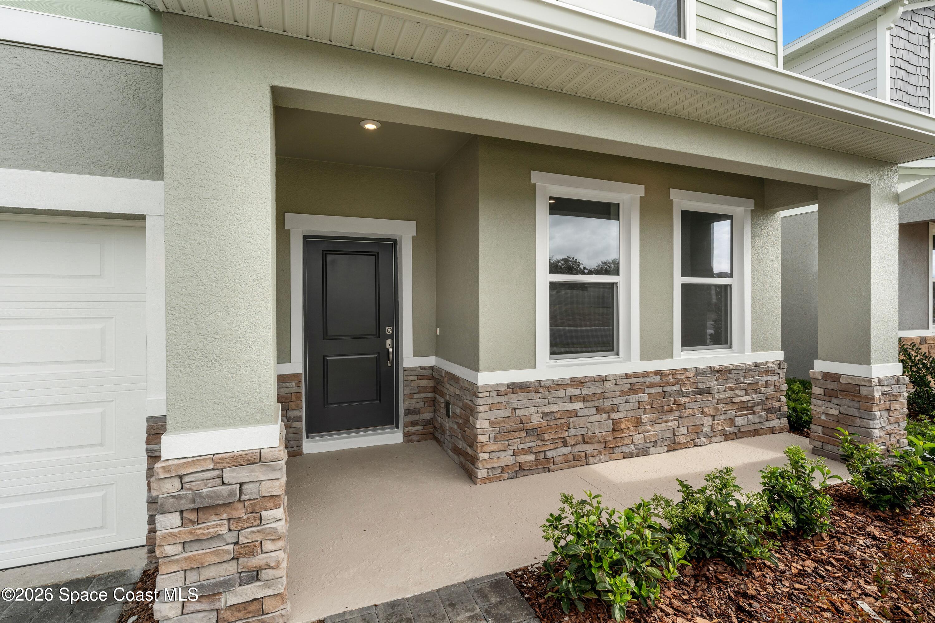 1005 Connolly Lane Northeast Palm Bay, FL 32905 - Photo 7 of 24 P_ORL_RCC_Chester_EXT_POR_Lot 31_Elevati