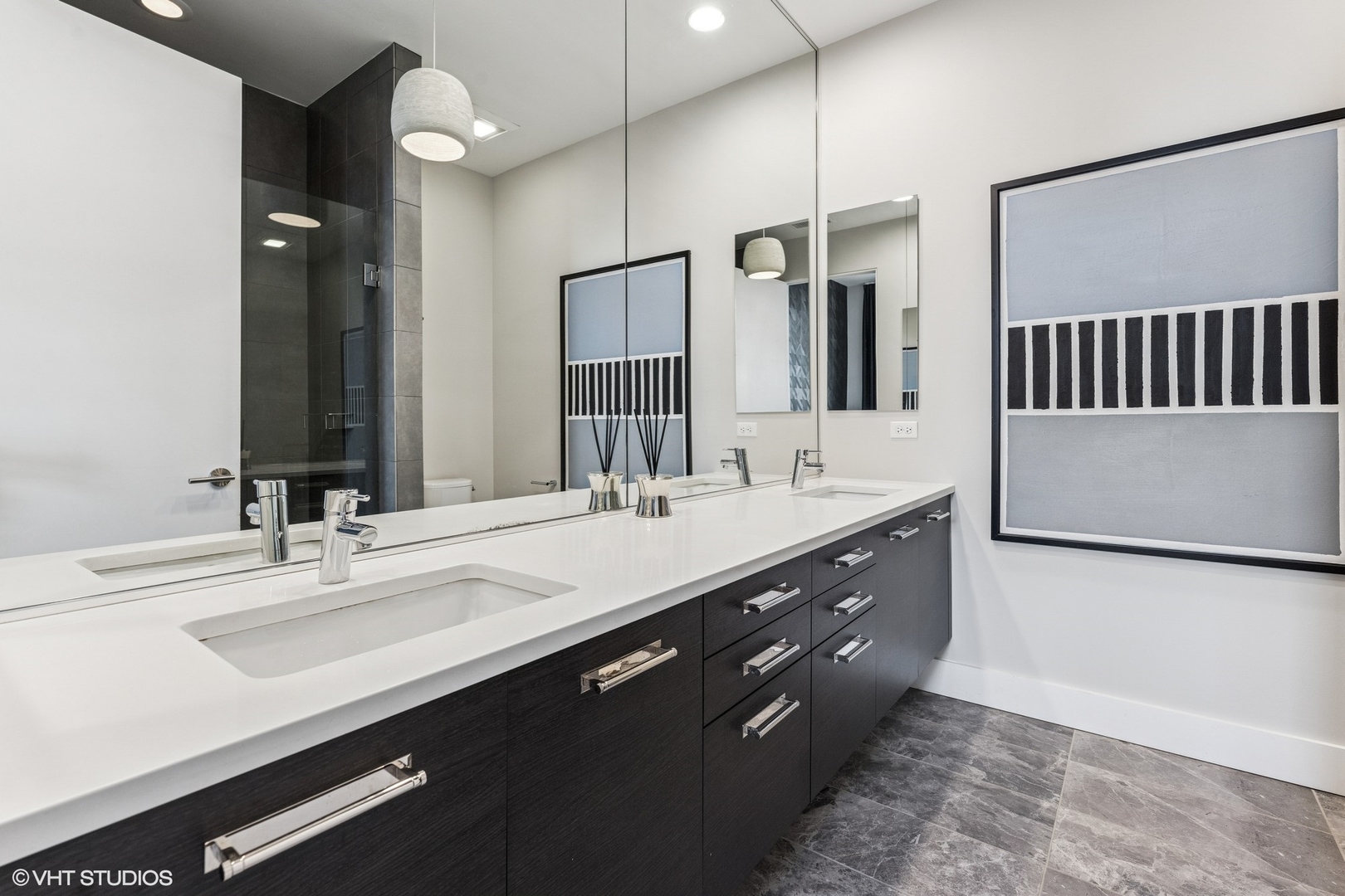 122 South Aberdeen Street, Unit 4S Chicago, IL 60607 - Photo 17 of 26 a bathroom with a double vanity sink and a mirror