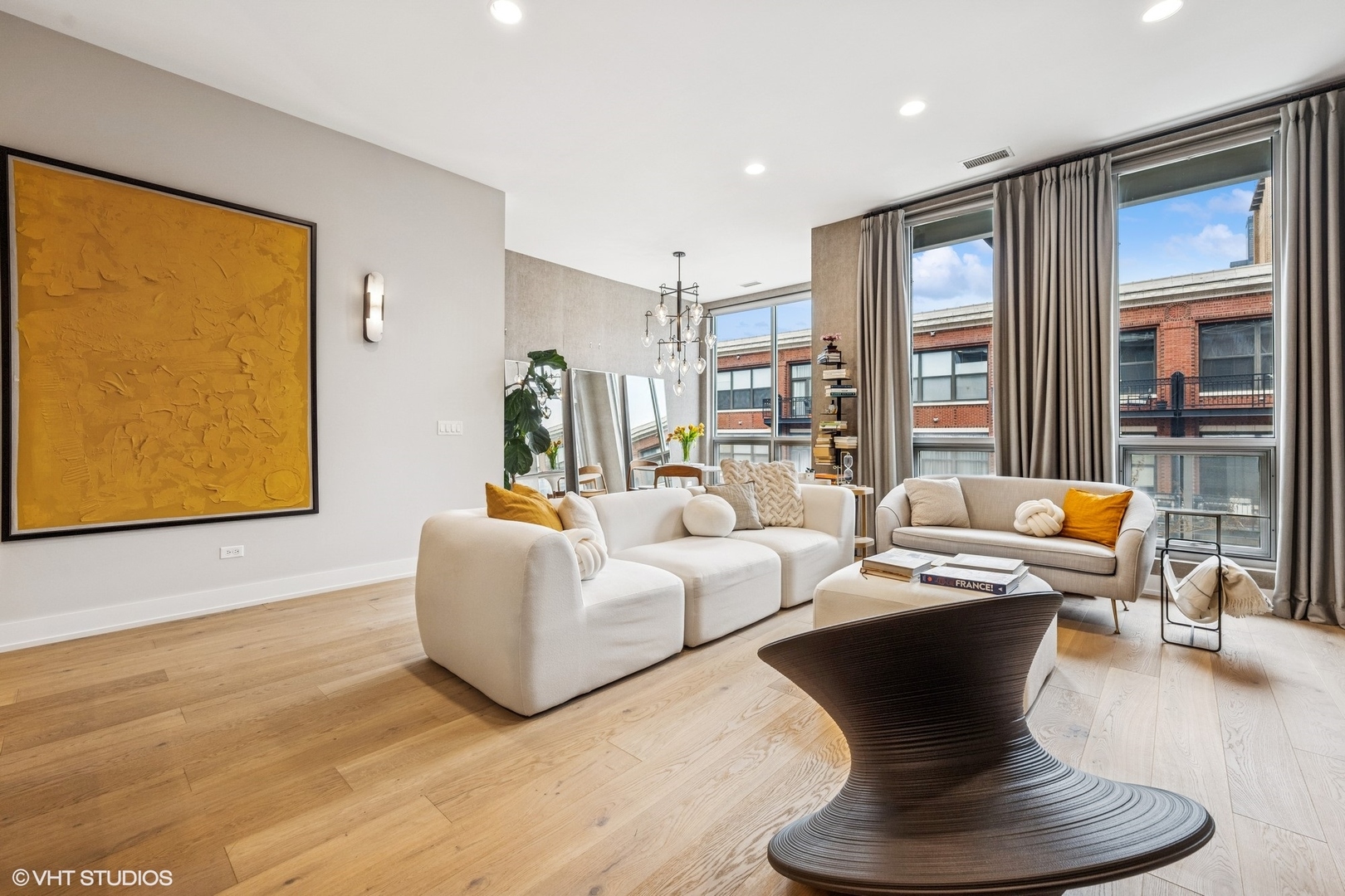 122 South Aberdeen Street, Unit 4S Chicago, IL 60607 - Photo 4 of 26 a living room with furniture or couch and a wooden floor