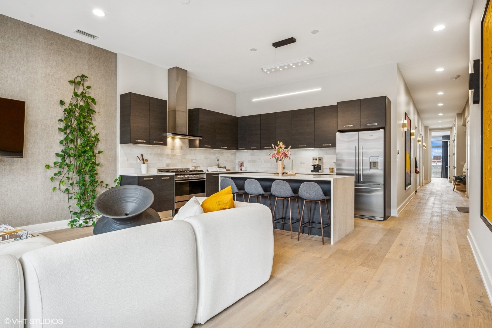 122 South Aberdeen Street, Unit 4S Chicago, IL 60607 - Photo 9 of 26 a kitchen with a sink a counter and cabinets