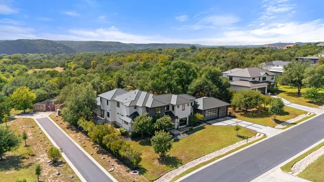 aerial view of a house with a garden