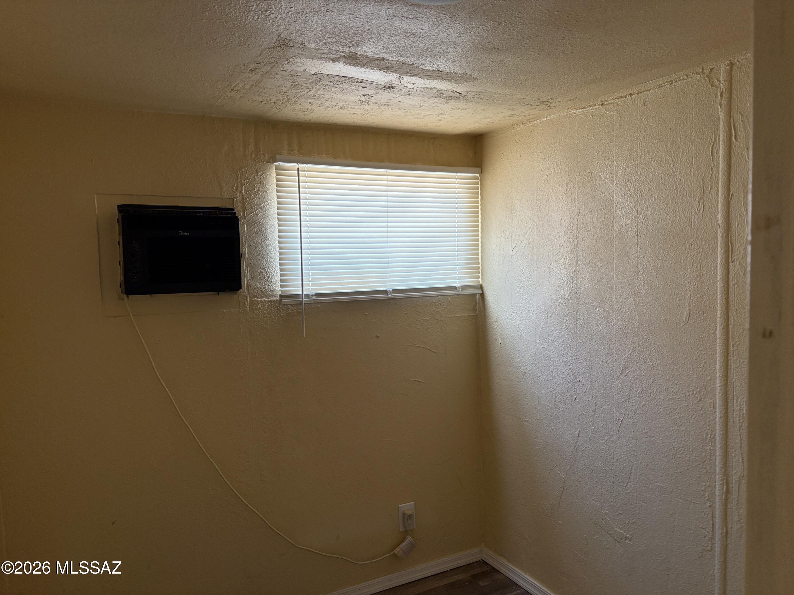 1741 West Wetmore Road, Unit 29 Tucson, AZ 85705 - Photo 6 of 10 a view of storage and utility room with window