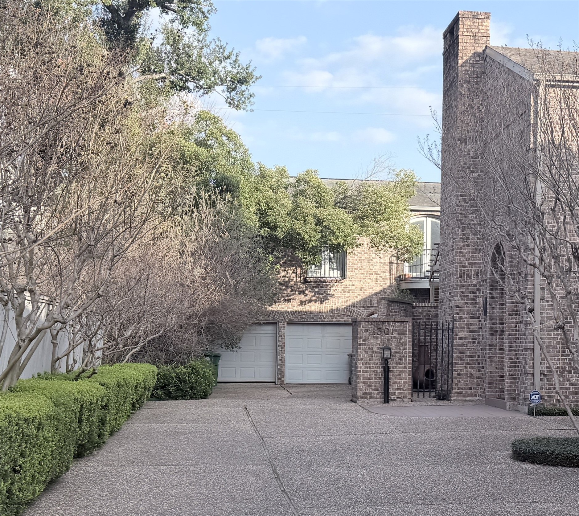 1499 Potomac Drive Houston, TX 77057 - Photo 1 of 21 a front view of a house with a yard and garage