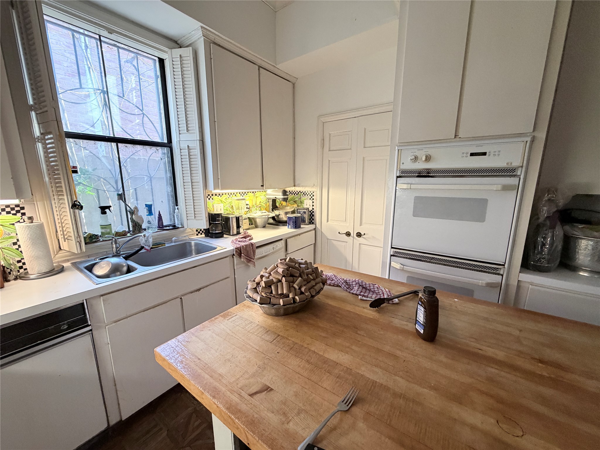 1499 Potomac Drive Houston, TX 77057 - Photo 8 of 21 a room with a window a sink and a counter top space