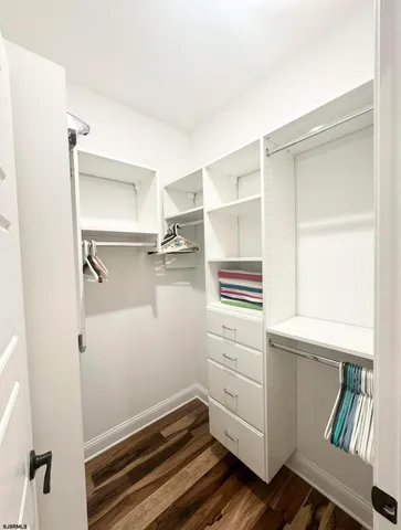a bathroom with a double vanity sink mirror and