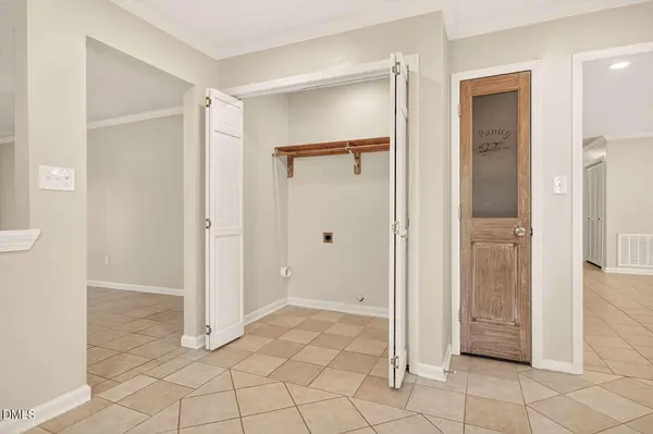 a view of a bathroom with a glass door shower