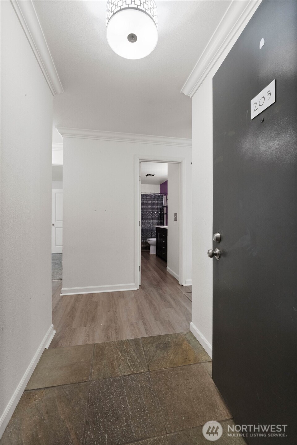 31500 33rd Place Southwest, Unit C203 Federal Way, WA 98023 - Photo 15 of 29 wooden floor in a gallery