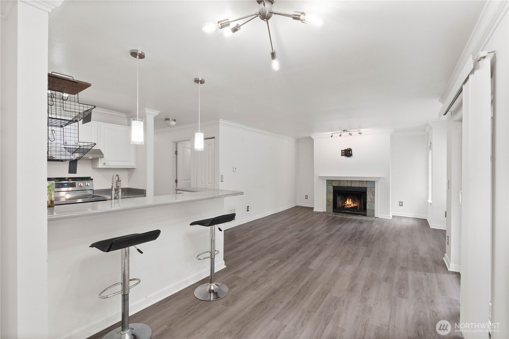 31500 33rd Place Southwest, Unit C203 Federal Way, WA 98023 - Photo 10 of 29 a view of kitchen with sink and wooden floor