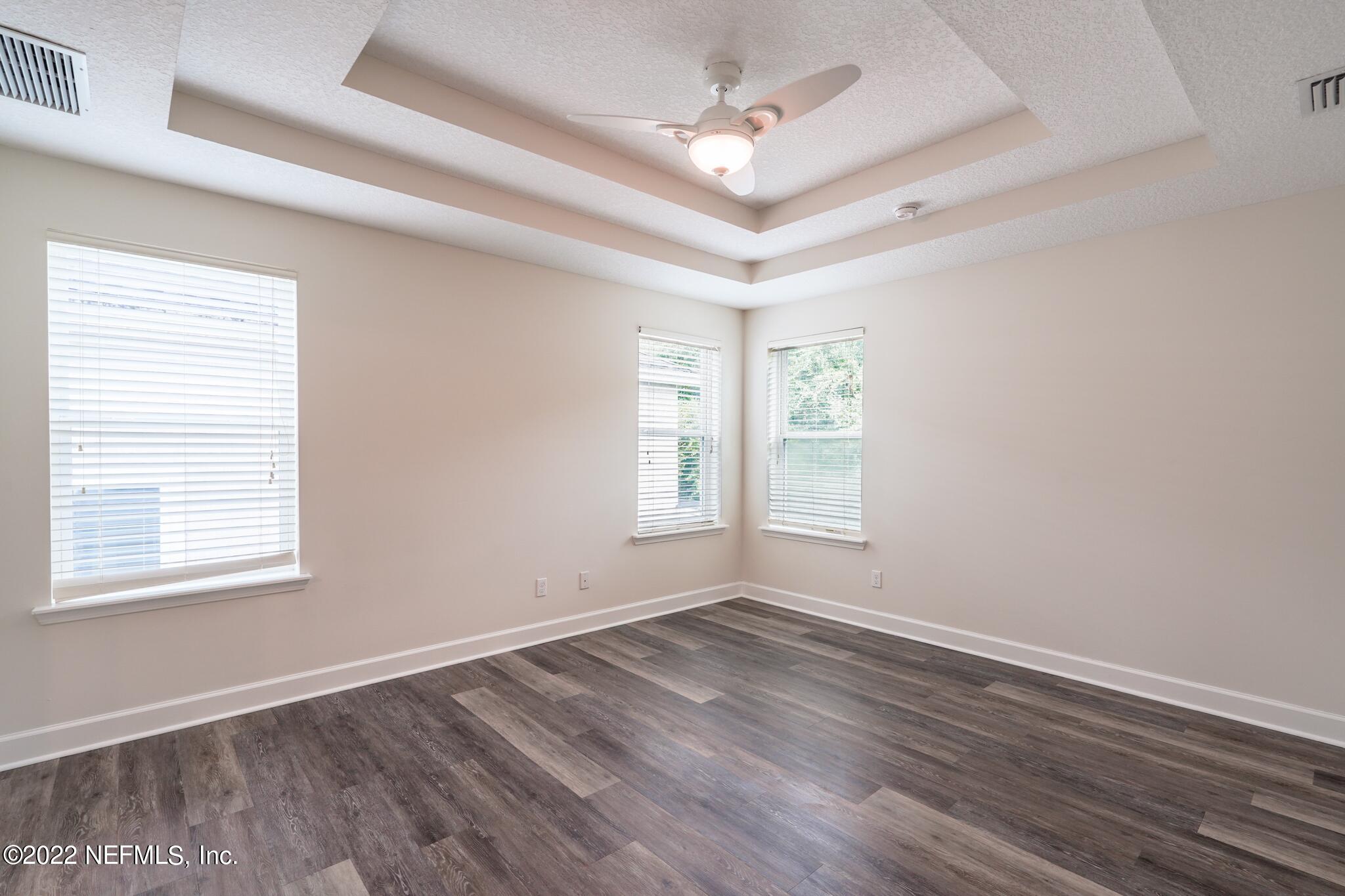237 Spring Park Avenue Ponte Vedra, FL 32081 - Photo 25 of 48 Primary bedroom Trey ceilings