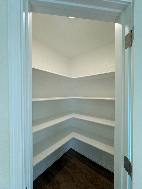 501 Double Vision Road Jarrell, TX 76537 - Photo 19 of 36 a storage room with wooden floor