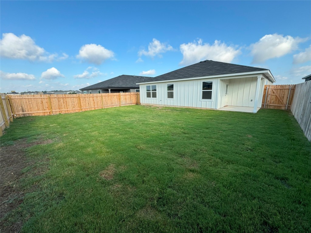 501 Double Vision Road Jarrell, TX 76537 - Photo 33 of 36 a front view of house with yard and seating area