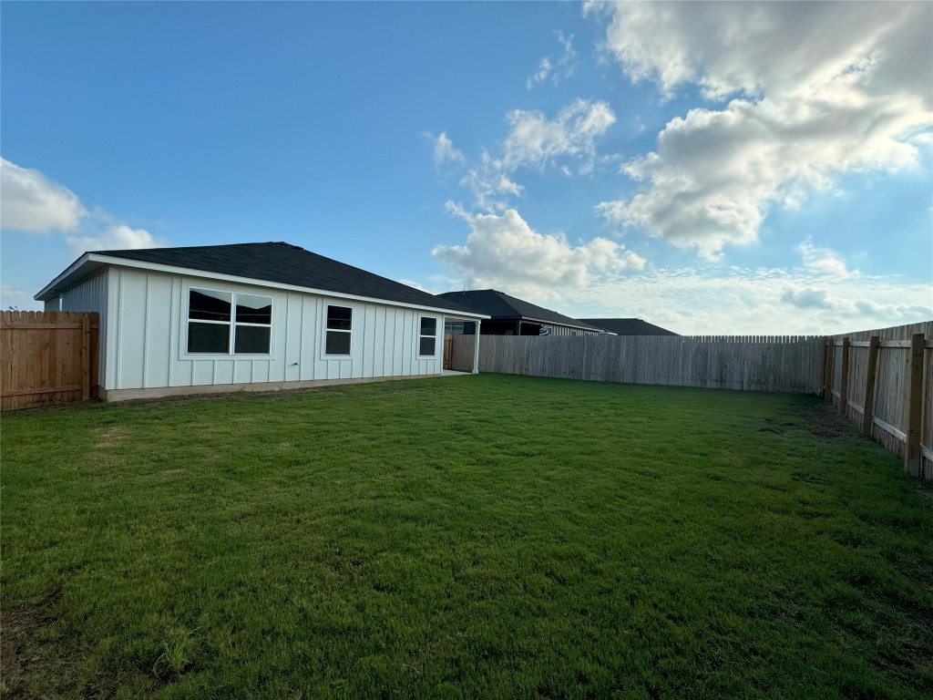 501 Double Vision Road Jarrell, TX 76537 - Photo 34 of 36 a view of a house with a backyard