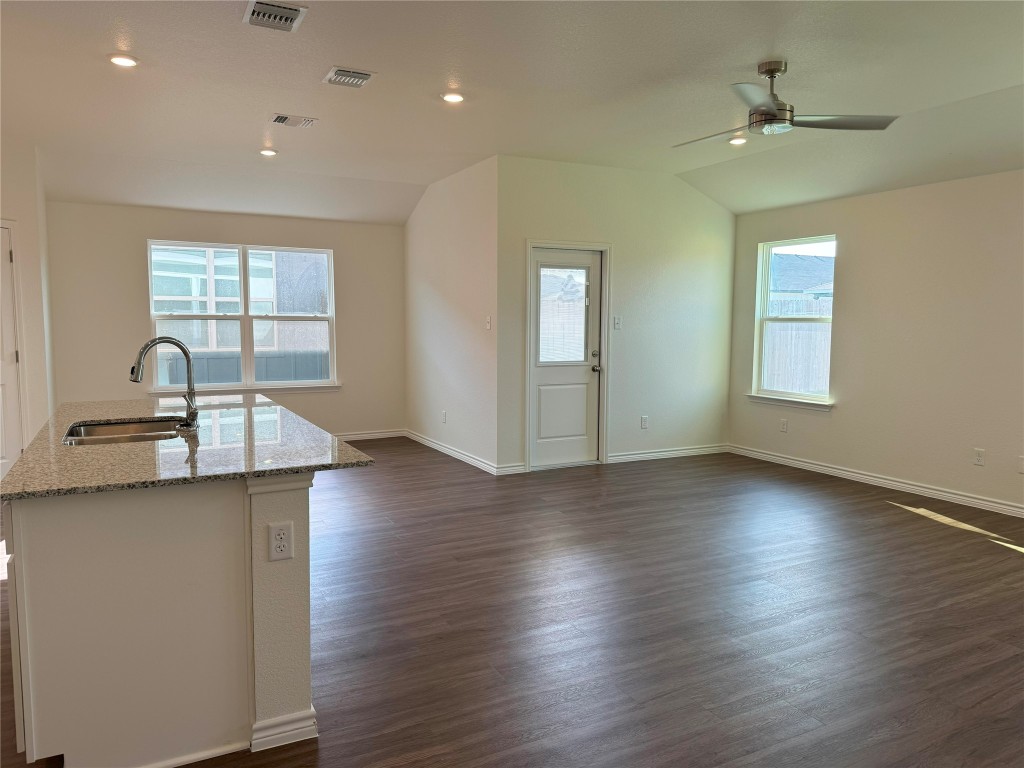 501 Double Vision Road Jarrell, TX 76537 - Photo 5 of 36 wooden floor in an empty room with a window