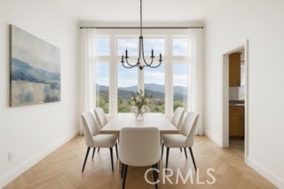 24932 Normans Way Calabasas, CA 91302 - Photo 13 of 63 a dining room with furniture and window