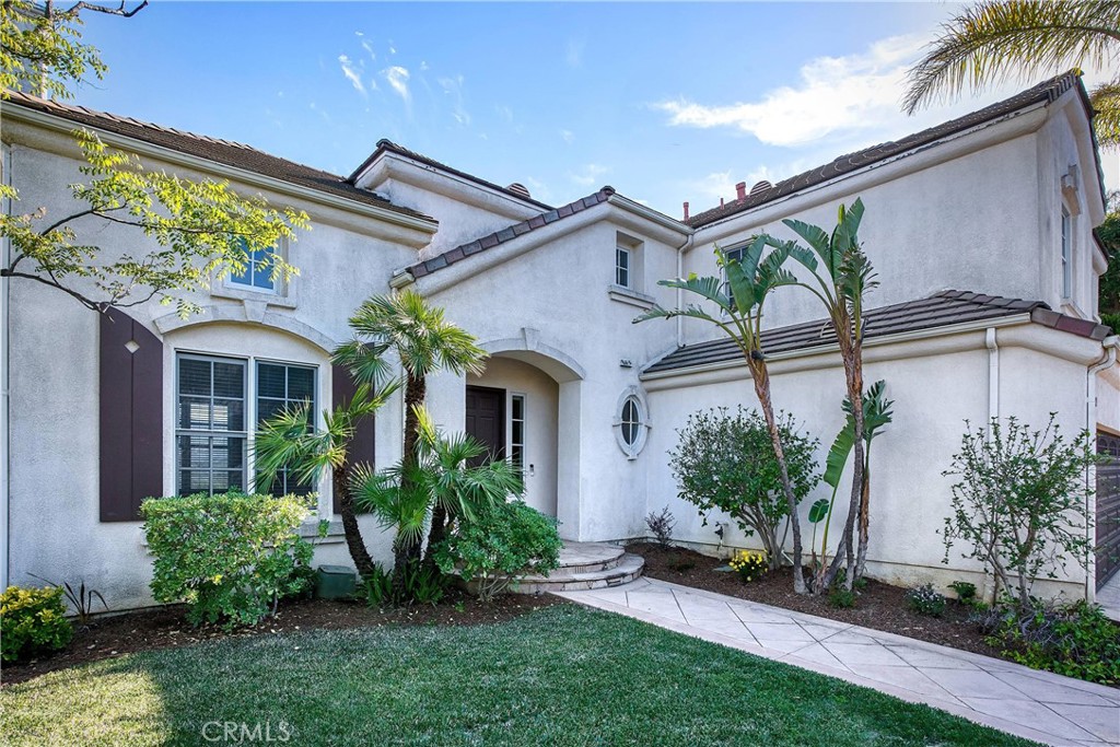 24932 Normans Way Calabasas, CA 91302 - Photo 5 of 63 a front view of a house with garden