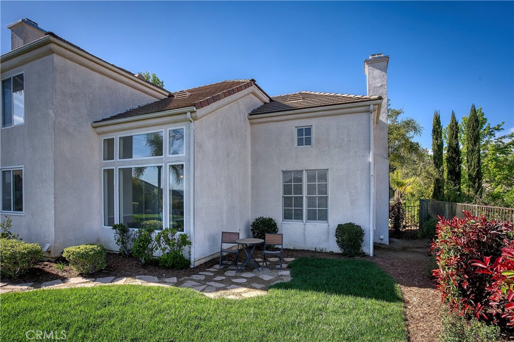 24932 Normans Way Calabasas, CA 91302 - Photo 51 of 63 a view of a house with backyard and garden