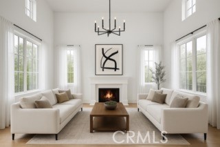 24932 Normans Way Calabasas, CA 91302 - Photo 9 of 63 a living room with furniture fireplace and window
