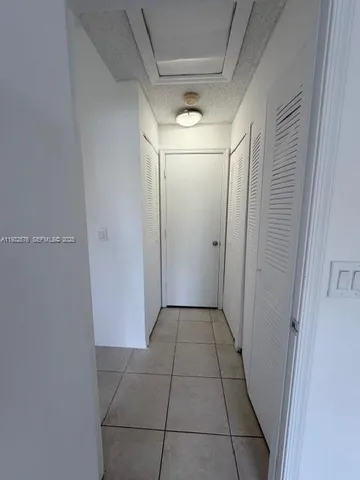 a bathroom with a toilet and a bathtub