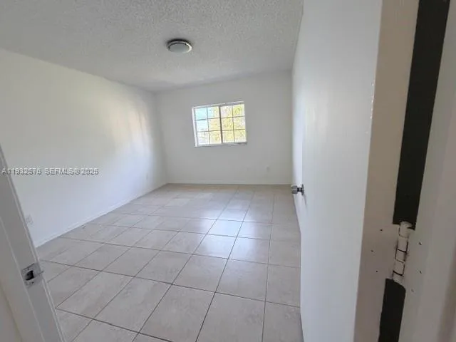 a view of a storage and utility room