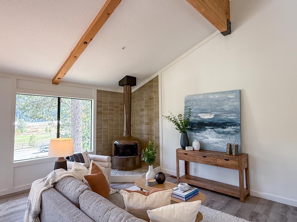 1560 Olympic Vly Road, Unit 14 Olympic Valley, CA 96146 - Photo 3 of 26 a living room with furniture and a large window