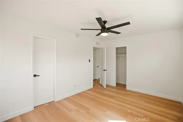 a bathroom with a sink toilet and a mirror
