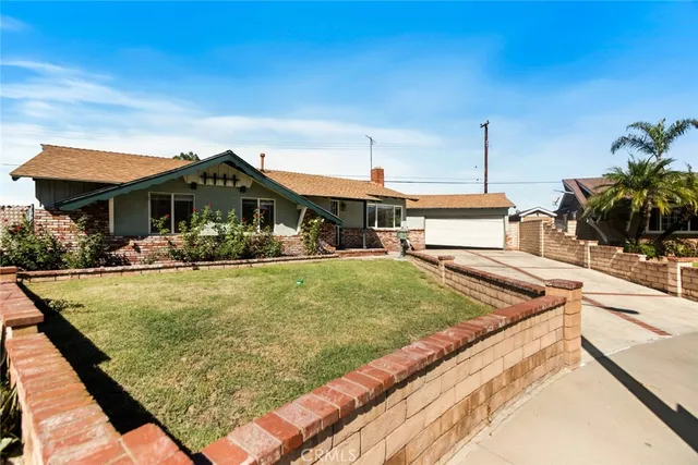 a view of a house with swimming pool