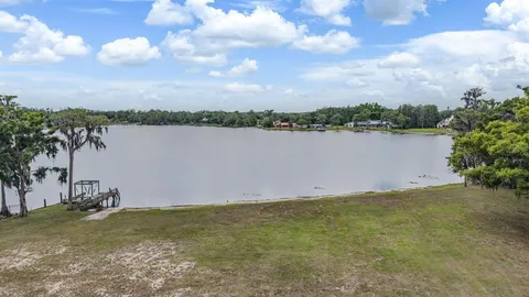 a view of a lake from a yard