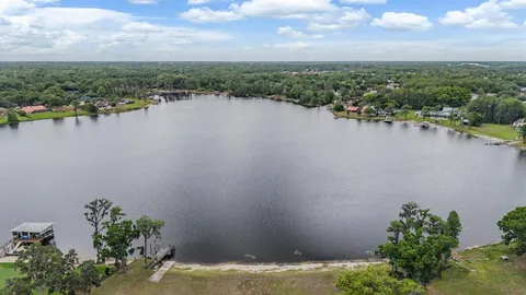 a view of a lake with a city