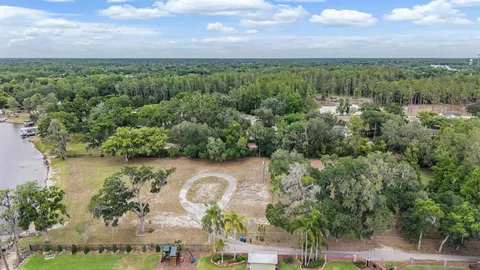 an aerial view of a houses with outdoor space